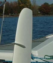 Rudder with anti-cavitation fence